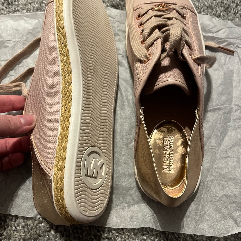 Michael Kor’s pink and gold sneakers.